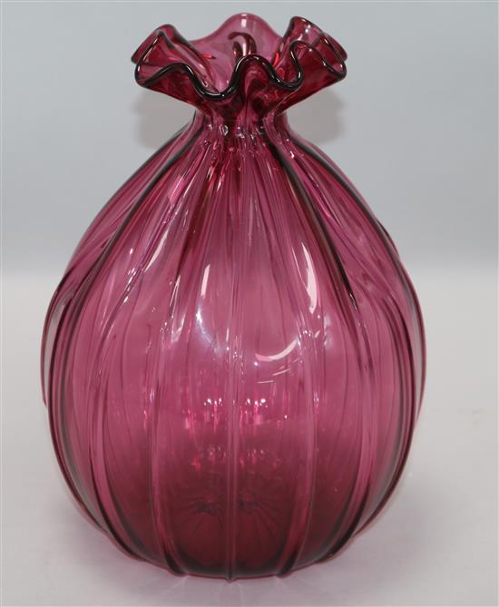 A cranberry glass vase 9.5in.
